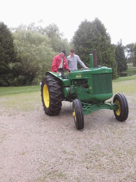 If ever you visited Robert, you knew you were going to go see his green and yellow machines. His love for John Deere tractors was well known and he always made sure to introduce his guests to his prided antiques. As the grandkids can remember, Bob enjoyed
