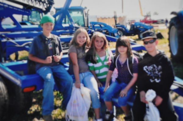 Normanby School trip to the plowing match. Here's Shylin with her pretty smile, having fun with her friends. - 2009